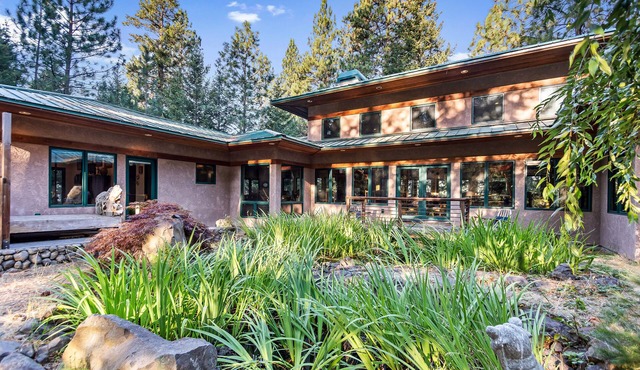 Rustic contemporary in a private forest setting overlooking Lake Coeur d’Alene