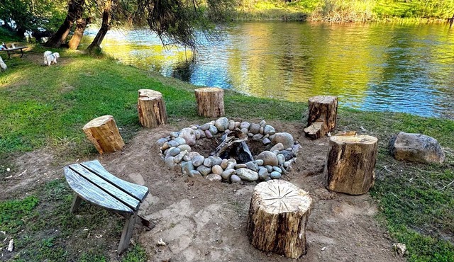 Rustic cozy cabin on rivers edge