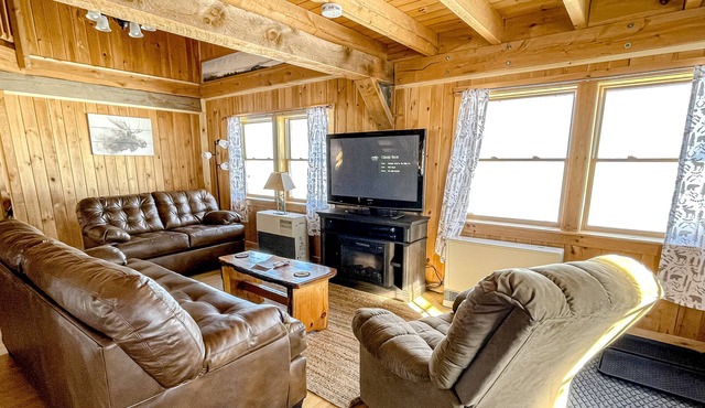 Rustic dog-friendly lakefront home with private beach, lake views, firepit, AC