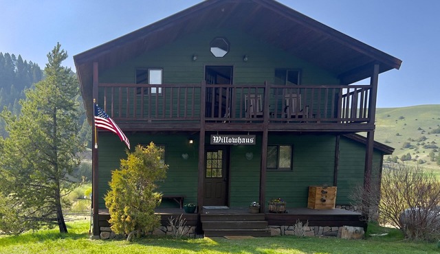 Rustic Farmhouse on 206 acres with private trout stream running through it…