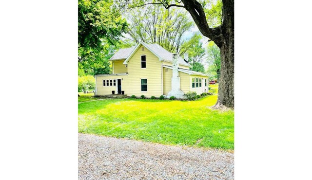 Rustic Farmhouse with Spacious Wooded Lot