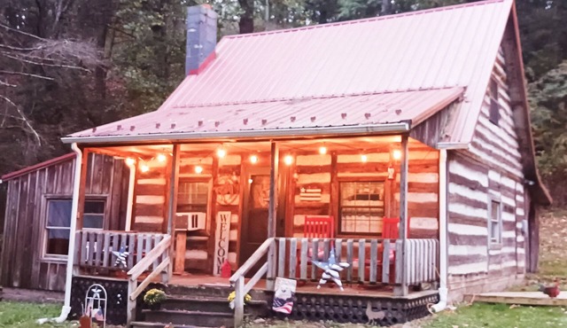 Rustic fireplace 1800s Log Cabin WIFI TV, Sleeps 8, see details read discounts