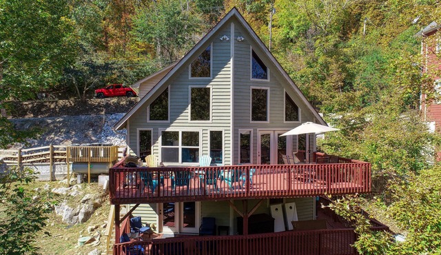 Rustic Lakefront Cabin with private double-deck dock, slide, hot tub, more!