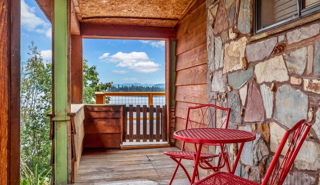 Rustic lakeview cabin w/gas grill, large deck, mountain views, W/D, wood stove