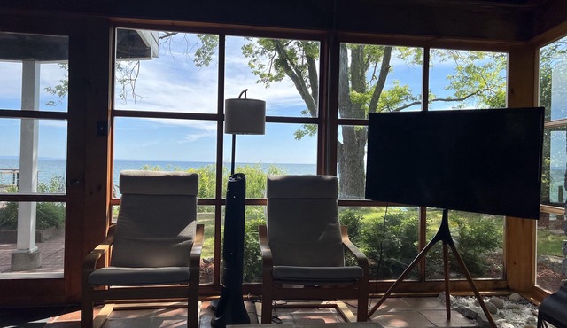 Rustic Log Cabin With A Private Beach.