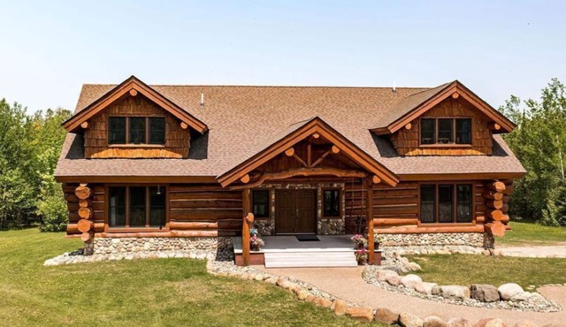 Rustic log home with lots of room to relax.