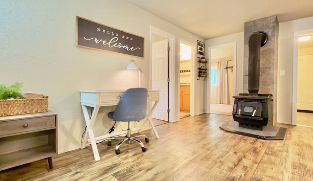 Rustic, pet-friendly Olympia cottage on wooded acres with patio, fire pit, and modern comforts