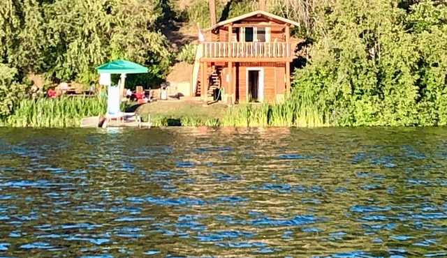 Rustic Ruby Retreat Cozy Cabin on Jump Off Joe Lake w/Private Dock & Mt. Views-
