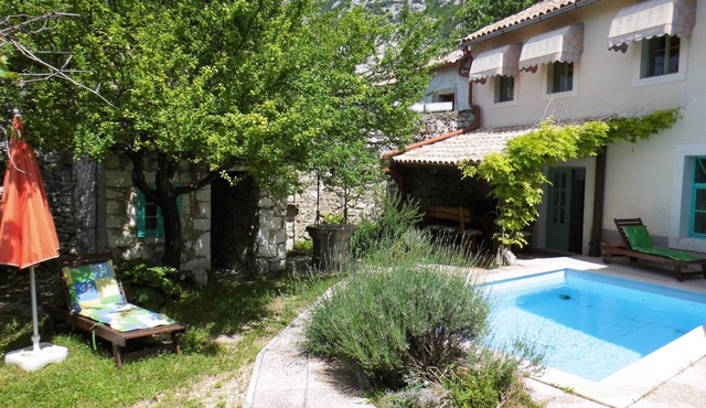Rustic stone house with pool