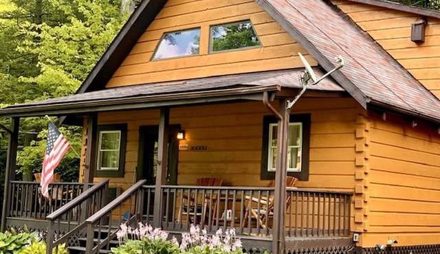 Rustic Wooden Cabin Settled Between Trees in Monterville, West Virginia