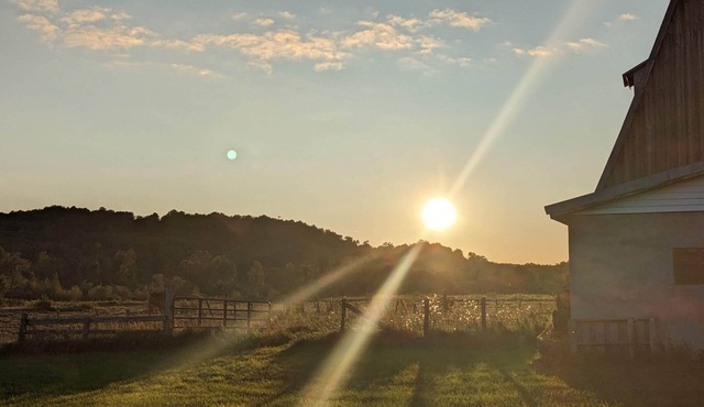 Rv parking spot with 30 Amp hook up and water. No dump station. Bring your toys!