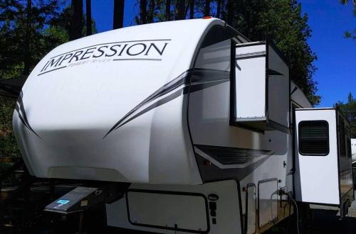 Rv42 With Large Deck On A Creek