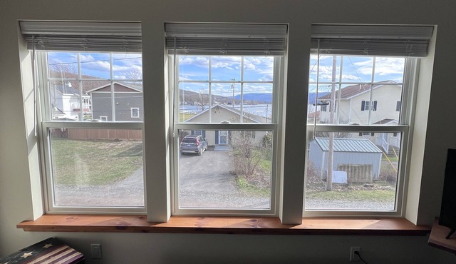Sale! Lakeside 2 bdrm Apartment steps from lake. Private Beach and Park