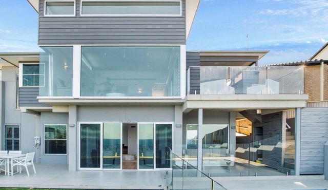 Salt n Sol - coastal split-level home with pool, alfresco dining, and breathtaking Kiama ocean views