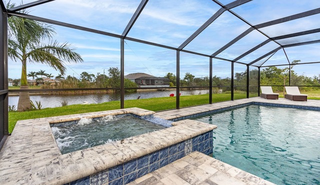 Salt water pool home with hot tub on fresh water canal and 40 foot pier 🌴