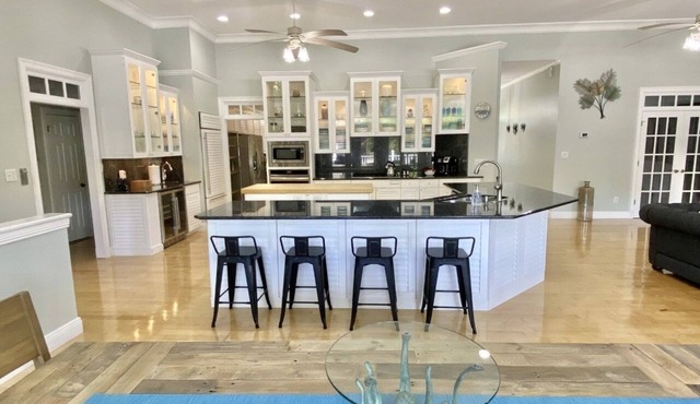 Salty Pelican Retreat on Canal with Pool, Elevator and Boat Dock