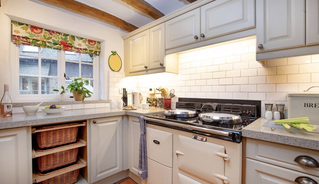 Sampsons boasts a plethora of characterful features, including a wood burning stove, exposed wood