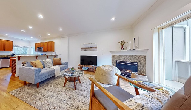 Sand Point Area Townhome with a great location, gas fireplace, & patio area!