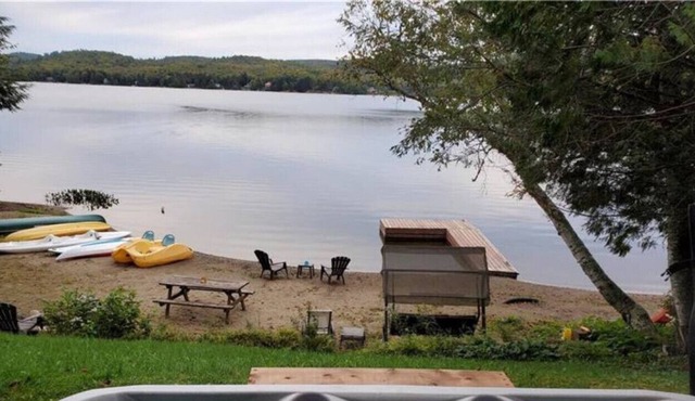 Sandy beach with spa and fire pit