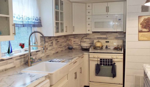 Sandy's Lake Chateau - Beautifully updated home on 3 private acres.