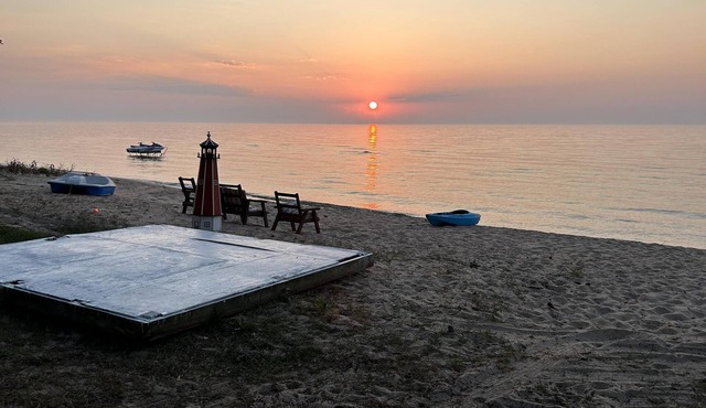Sandy Toes Retreat: Winter Wonderland Awaits at Sandy Toes Retreat: Ice Fishing, Snowmobiling & More