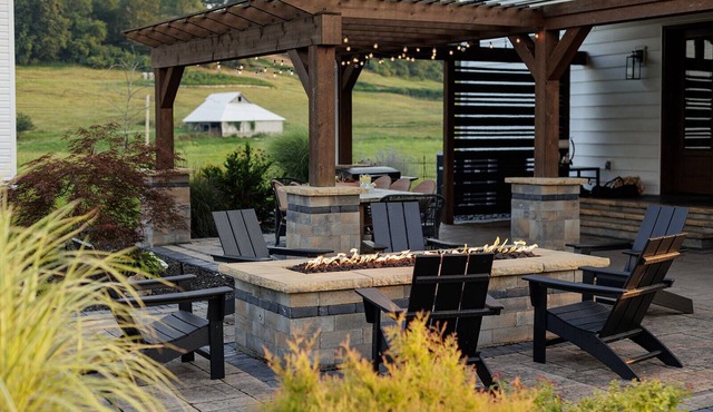 Scenic farm escape w/resort style patio, hot tub and designer kitchen!