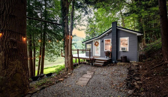 Scenic Retreat: Riverfront Cabin with Large Deck and Fire Pit in Emlenton, Pennsylvania