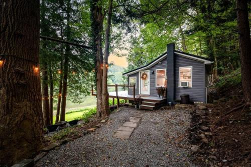 Scenic Retreat: Riverfront Cabin with Large Deck and Fire Pit in Emlenton, Pennsylvania