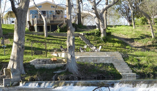 Scenic riverfront home on quiet stretch of Guadalupe - waterfall by front porch
