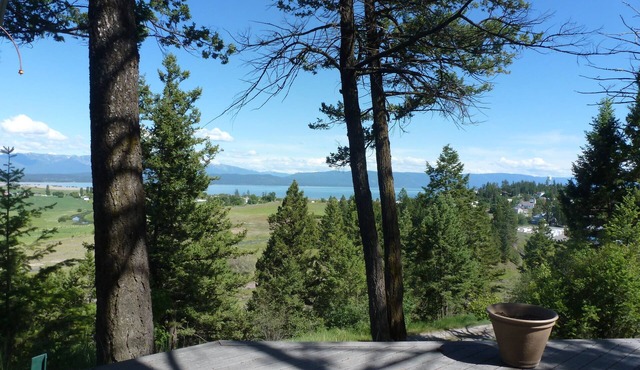 Scenic View Of Flathead Lake With Mission Mtns In The Background