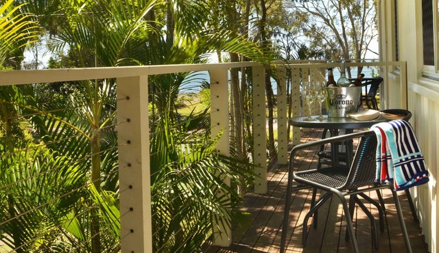 Sea Breeze & partial Water Views among the palm tree canopy -Apt 4.