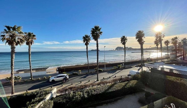 Seafront apartment with private parking