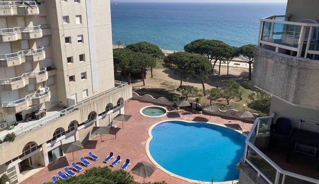 Seafront apartment with balcony