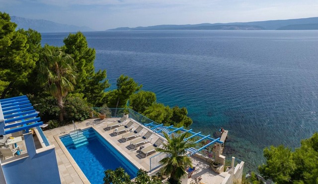 Seafront Villa Azzurro with heated pool, panoramic sea views, walking distance to beach-shop-restaurant