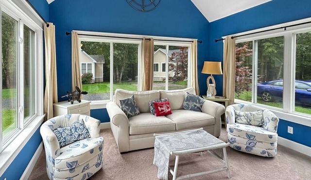 Seaglass Village Unit 182: 2BR in Wells, featuring a King bed and bunk beds for 4 guests.