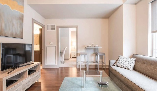 Seaport District 1 BR | Outdoor Pool | sun deck