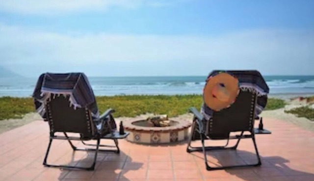 Searenity Keep an eye on kids. You: on patio with a refreshing beverage.