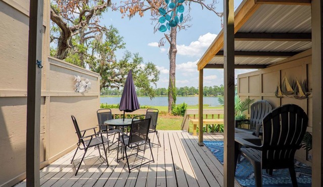 Seas The Day with this cozy 2-bedroom lakefront condo.