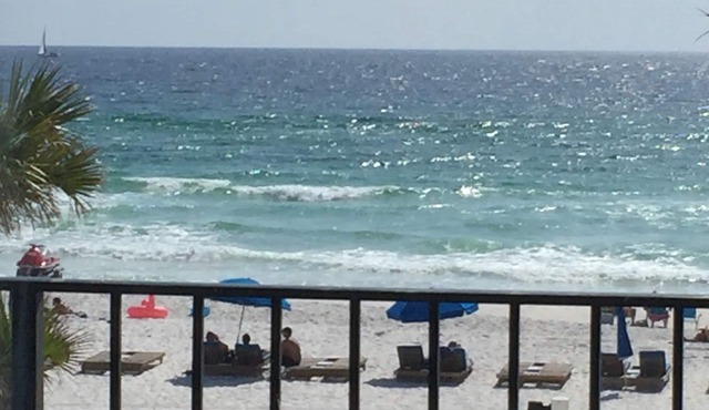 Seas the Days! 4th Floor spacious beachfront vacation condo for your family.