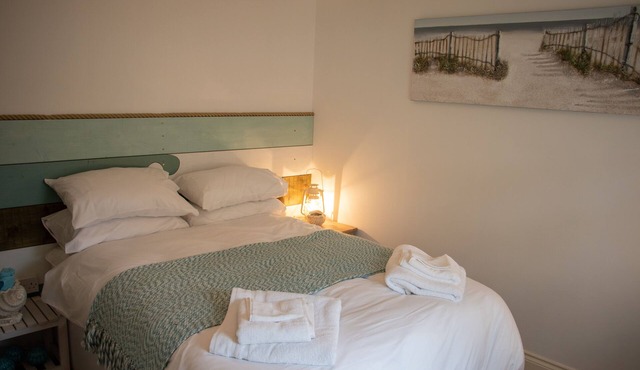 Seashells. The Beach House central apartment with parking