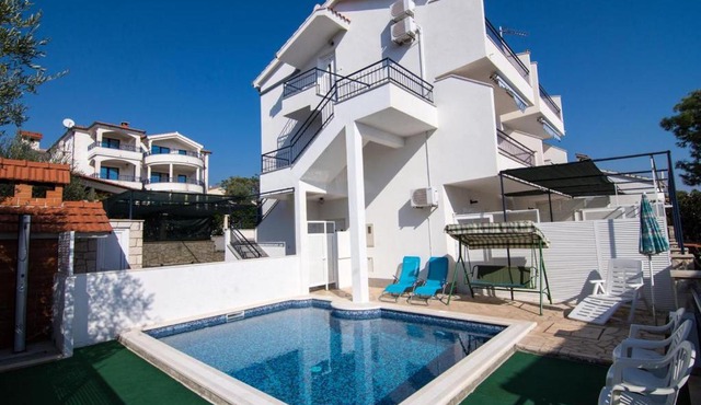 Seaside apartments with a swimming pool Rastici, Ciovo - 2793