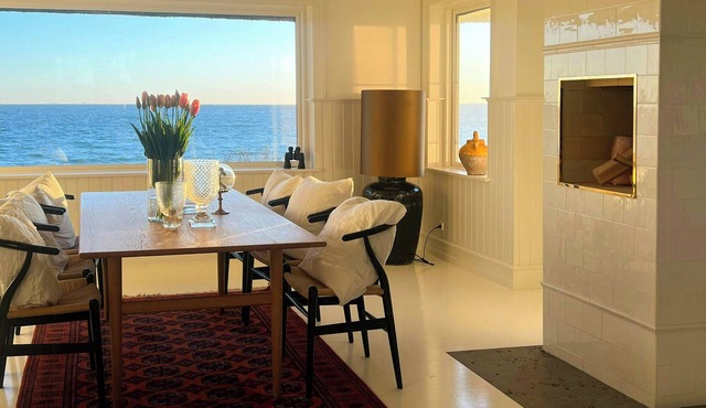 Seaside hotel-inspired home with sea view