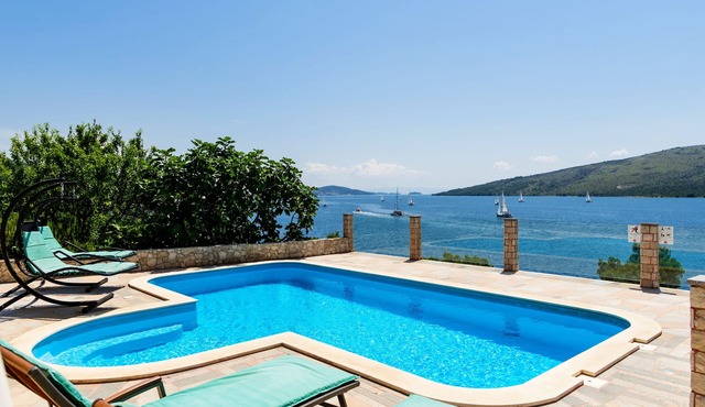 Seaside Villa, surrounded by pine forest with 34 m2 large heated swimming-pool.