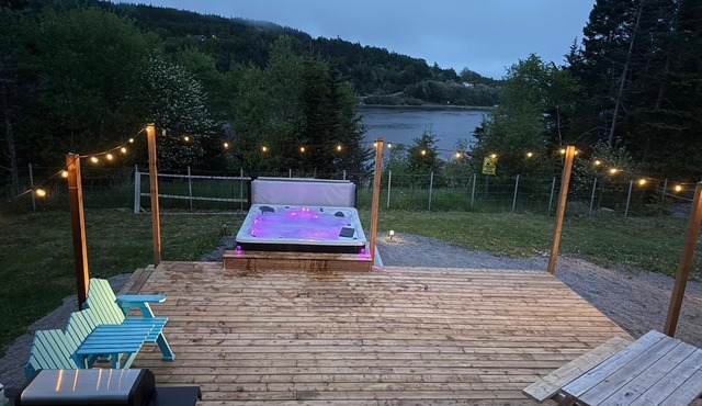 Seaside villa w/beach, waterfall, firepit, hot tub.