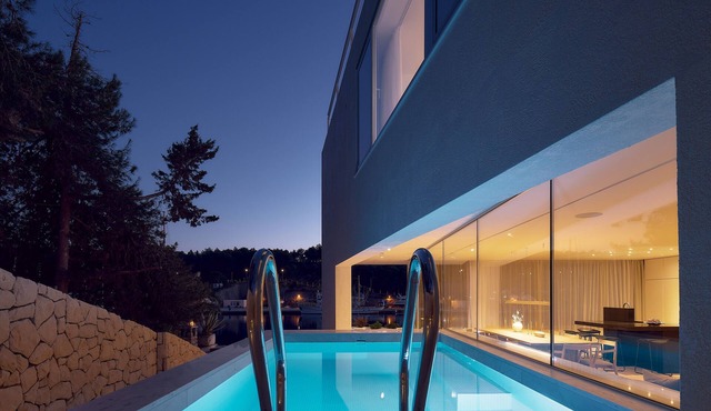 Seaside villa with panoramic harbor view with stunning sunsets.