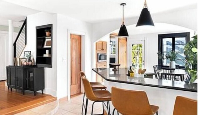 Seasonally Bustling house in the village of Skaneateles next to the lake