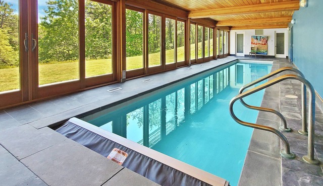 Secluded 4BD Great Island Mid Century-A/C, Indoor Pool, Screen Porch, Outdoor Shower, Close to Beach