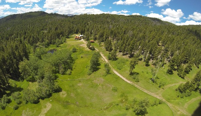 SECLUDED CABIN ON 65 ACRES SURROUNDED BY NATIONAL FOREST CLOSE TO HELENA
