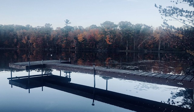 Secluded cabin on a lake, right on snowmobile trail