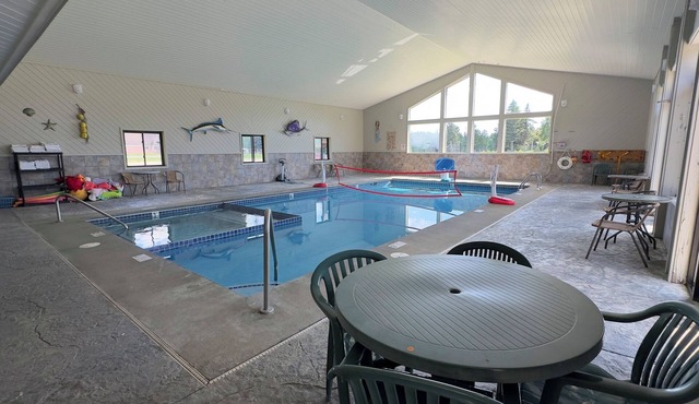 Secluded Cabin Sanctuary with Direct River Access & Indoor Pool